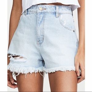 Rolla’s light wash distressed shorts